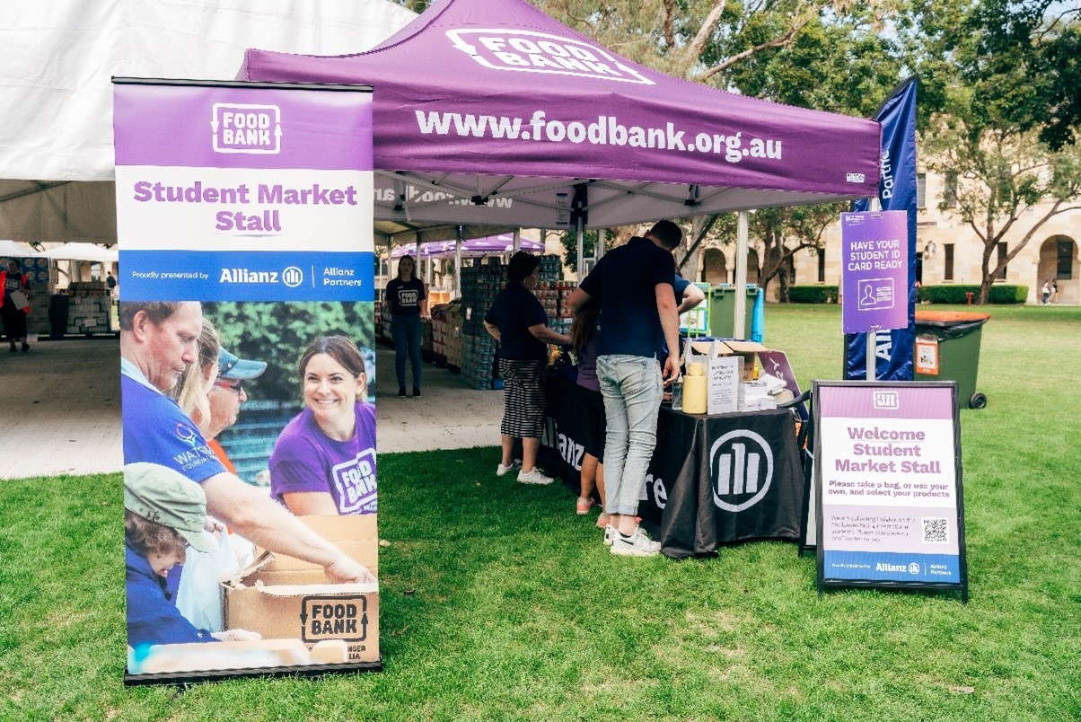 Market stall with Foodbank and Allianz Partners branding