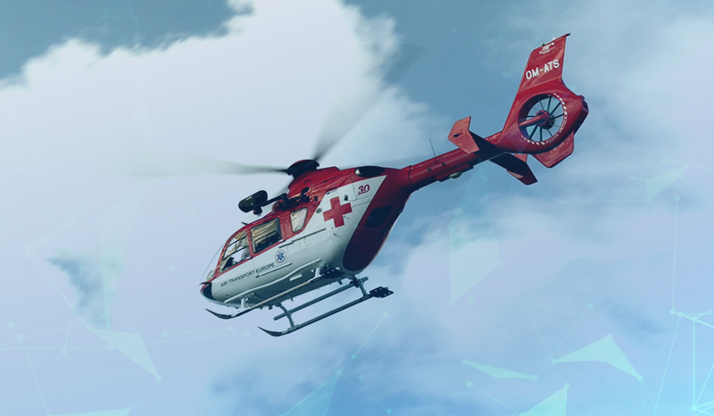 A helicopter in the air medically repatriating a customer