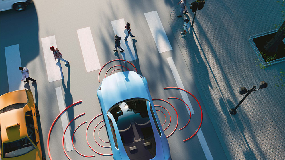 Autonomous vehicle detecting pedestrians and road users at an urban intersection.
