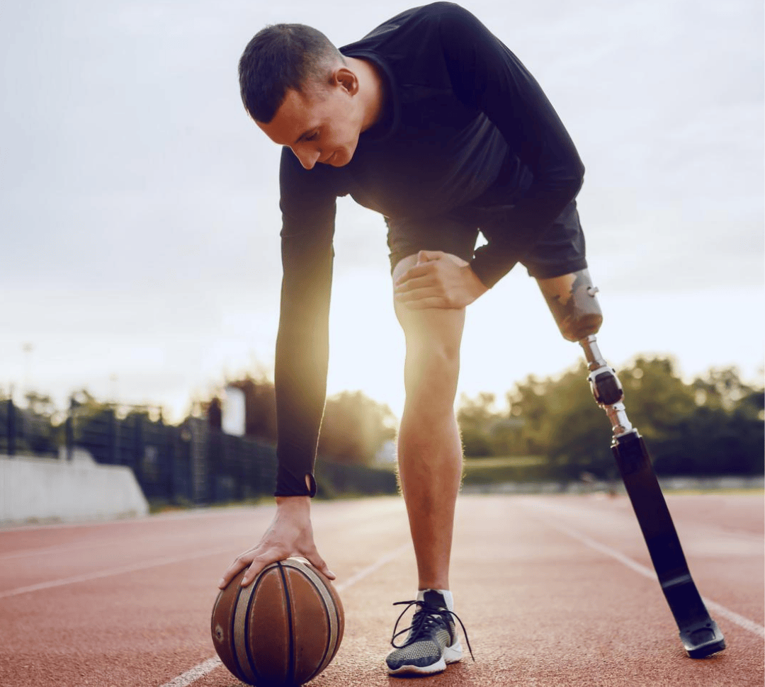 man-with-a-physical-disability-playing-basketball