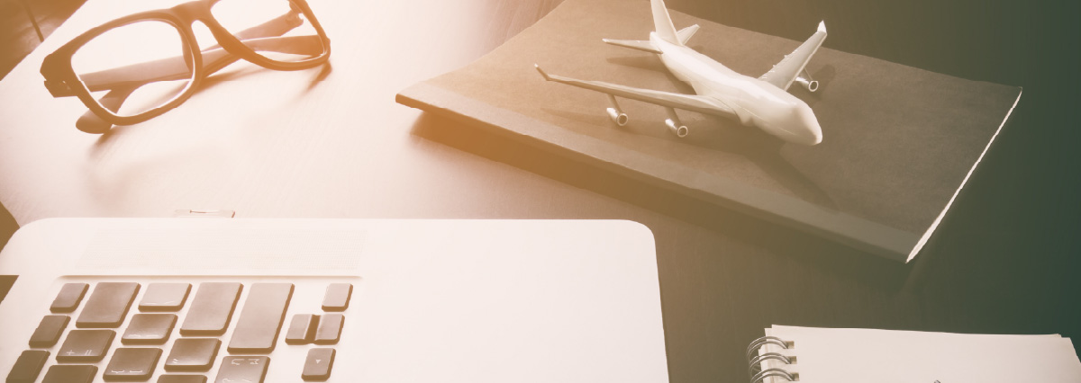 Business travel agency on computer working desk