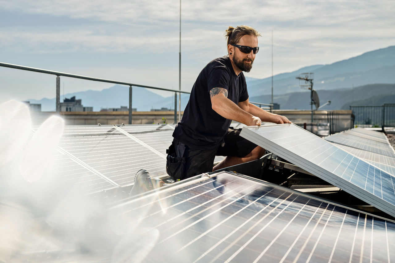 A man with solar panels