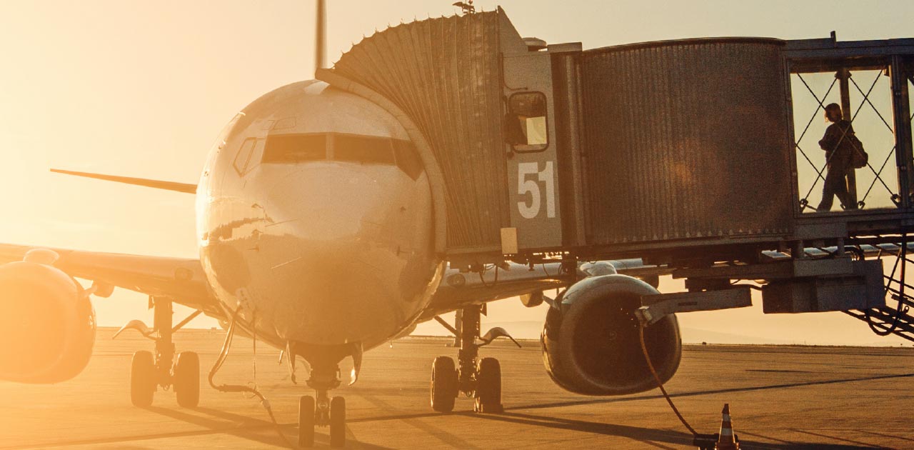 Beautiful evening sun on aircraft with docking station